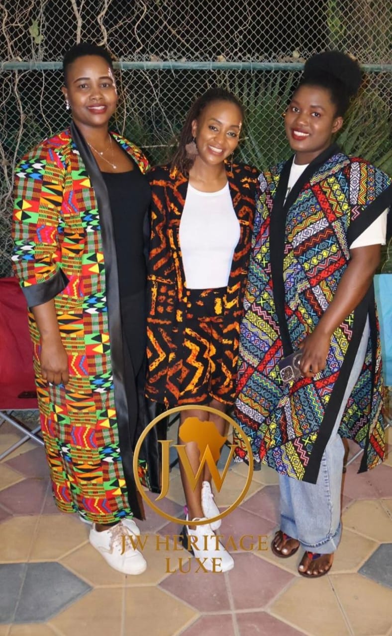 DJ performing with city lights visible